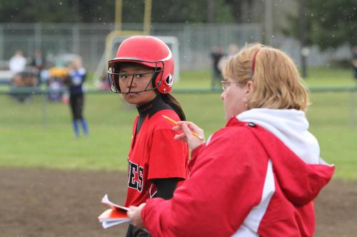 CHS coach Amy King (right) lays some knowledge down on Erin Josue. (John Fisken photos)