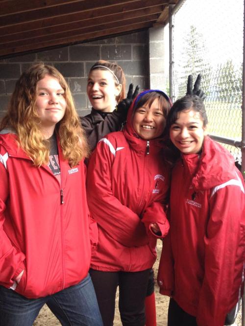 Wolf softball players (l to r) Kaily Kellner, Emily Coulter, Erin Josue and Robin Cedillo (Amy King photo)