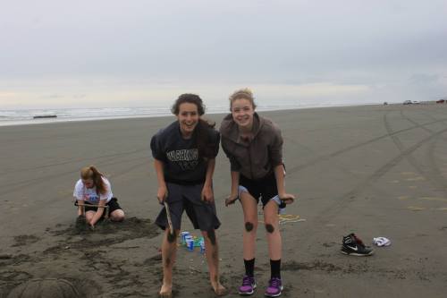 Wynter Thorne (middle, standing), also a pro at making sand castles with basketball teammates Monica Vidoni (left) and Kacie Kiel. (Amy King photo) 