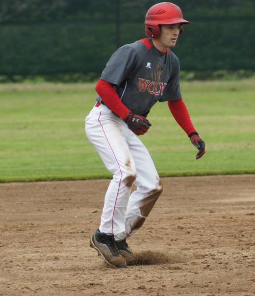 Kurtis Smith, whose RBI single sent CHS to state, dances off the bag. (Shelli Trumbull photo)