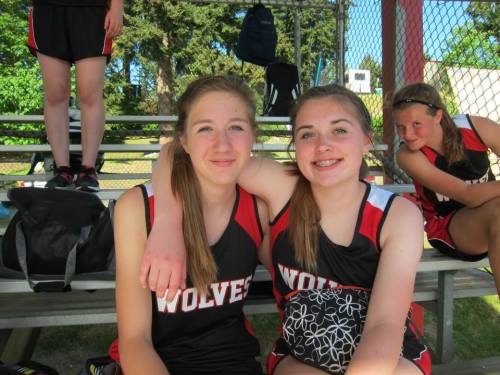 CMS throwers Emma Smith (left) and Maddy Hilkey get photobombed by speedy Lindsey Roberts. (Sherry Roberts photo)
