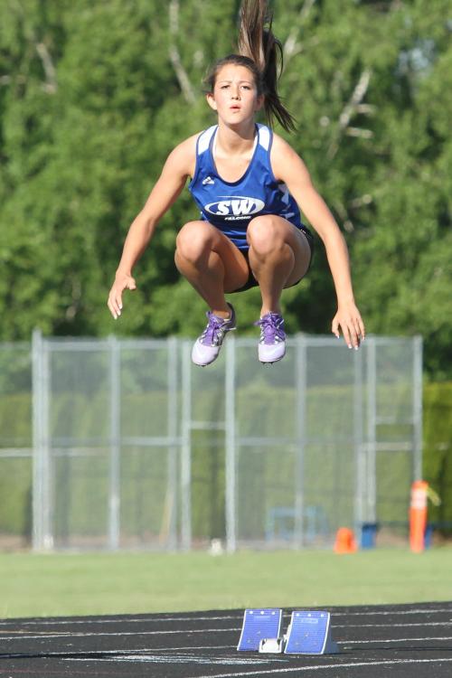 She just jumped over the freakin' fence (sort of...)!!!