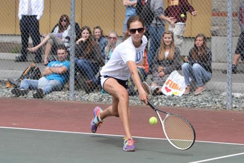 Hanigan goes low for a backhand.