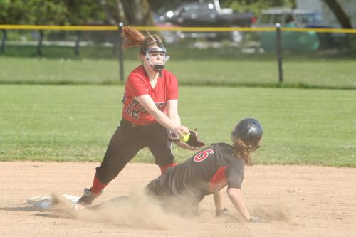 Emily Coulter stands tall, slappin' down the tag in a bang-bang play at second. (John Fisken photo)