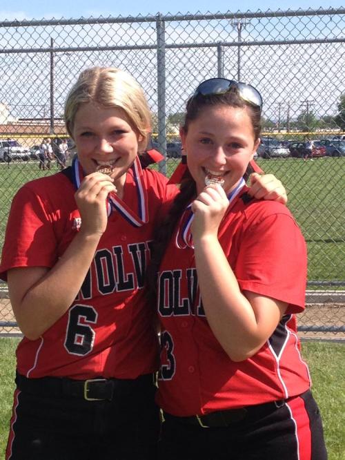 Breeanna Messner (left) and McKayla Bailey pose with the sportsmanship awards they won at the state tourney. (Amy King photo)