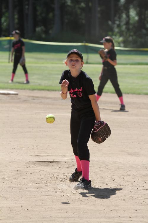 "That's called a fastball, sister! Good luck hittin' it!!" (John Fisken photos)