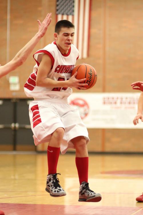 CJ Smith goes hard to the hoop. (John Fisken photo)