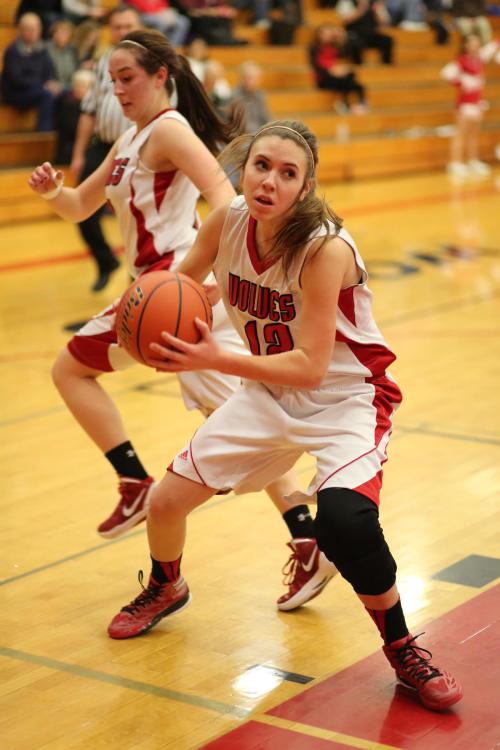 Even Amanda Fabrizi (left) knows to clear out when Julia "Elbows" Myers is in rebounding mode.
