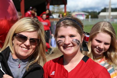 Senior Night for softball, with Roberts joined by mom Lisa Edlin (left) and lil' sis Ally. (John Fisken photo)
