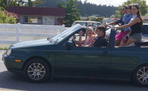 Big Hurt, little car -- All-State lineman Nick Streubel does chauffeur duty. (Shelli Trumbull photos)