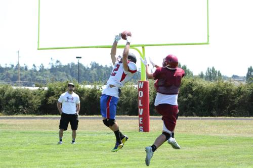 Josh Bayne skies to pick off a Lakeside pass.