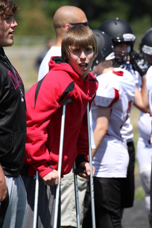 Fomer Wolf QB Gunnar Langvold hangs out on crutches