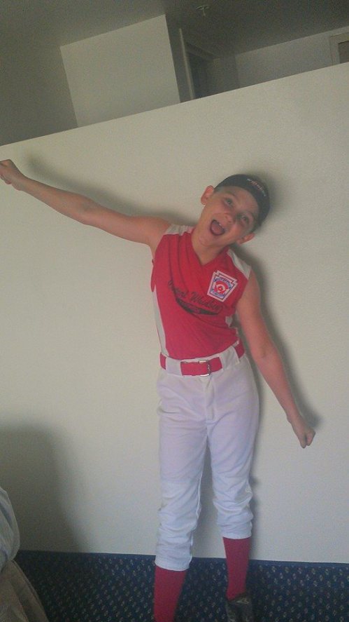 New uniforms made everyone happy. 106 degree weather, not so much. (Katy Wells photo)