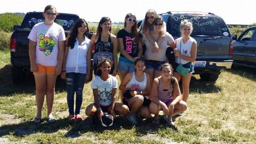 98.2% of the unbeaten 17-0 Central Whidbey Little League Juniors All-Star softball squad. One girl is missing from the photo. (Dawn Hesselgrave photos)