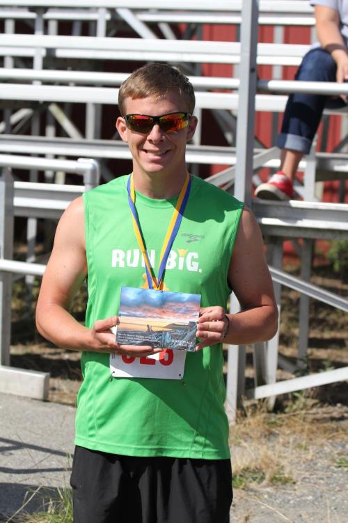 5K male winner Joshua Sharp.