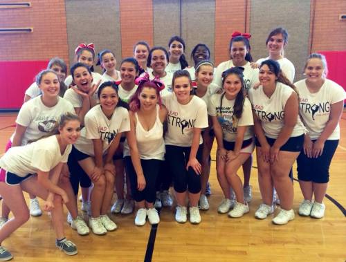 Wolf cheerleaders stop for a photo op during a team camp. (Cheridan Eck photos)