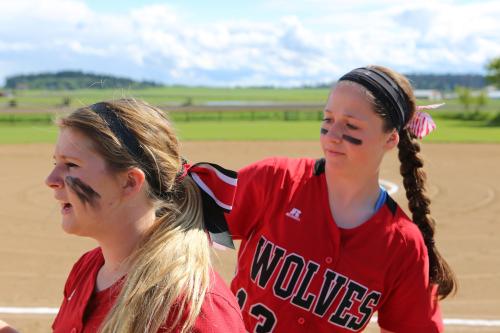 Bailey uses the Million Dollar Arm to check teammate Madeline Roberts' 