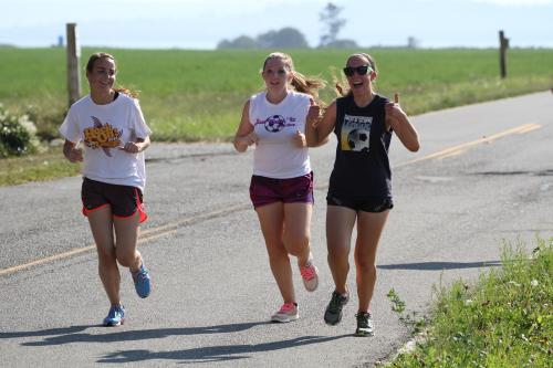 Wolves (l to r) ? Luvera, Jenn Spark and Marisa Etzell hit the road for conditioning work.