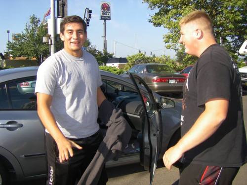 Oscar LIquidano (left) is reunited with his fellow senior lineman and captain Carson Risner. (Jennie Prince photo)