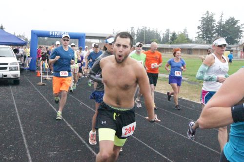Danny Savalza, running McConaughey style, sans shirt. (Shelli Trumbull photos)
