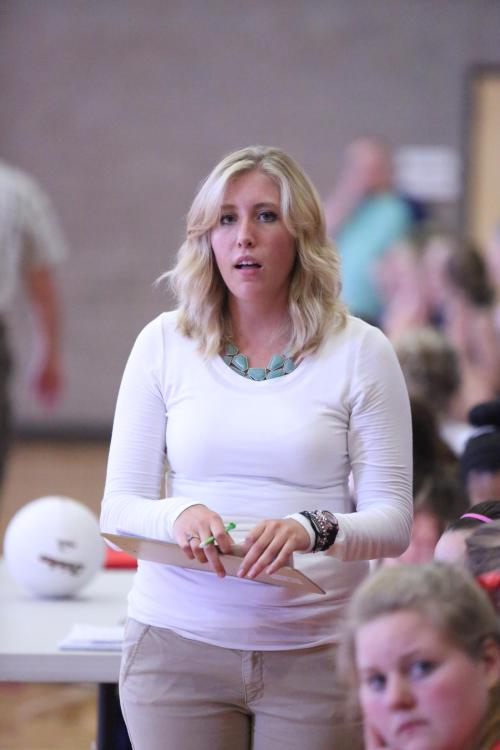 8th grade coach Sadi Foltz watches the action unfold.