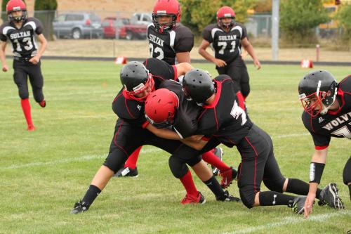 Team tackling at its finest.