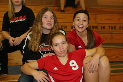 Freshman Lauren Rose (9) has become the team's starting setter. Here she hangs out with Kailey Kellner (left) and McKenzie Bailey.