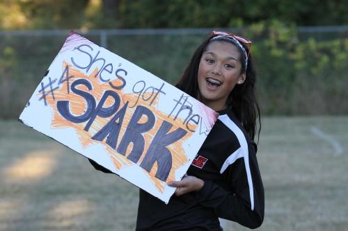 Makana Stone celebrates her former teammate, Jenn Spark, who had a stellar defensive game.