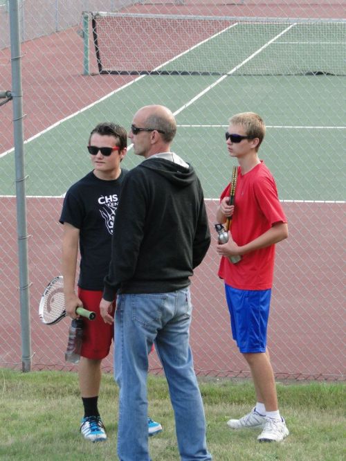 Grey Rische (left) CHS coach Ken Stange and Connor McCormick sport sunglasses in September. Nothing suspicious here...