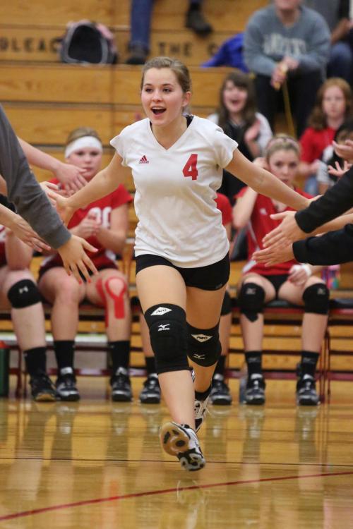 Valen Trujillo charges out during pregame introductions. (John Fisken photos)