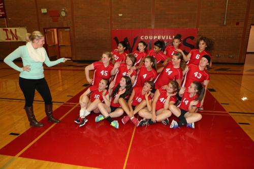 CMS 8th grade coach Sadi Foltz delivers a "pep talk" to her team.