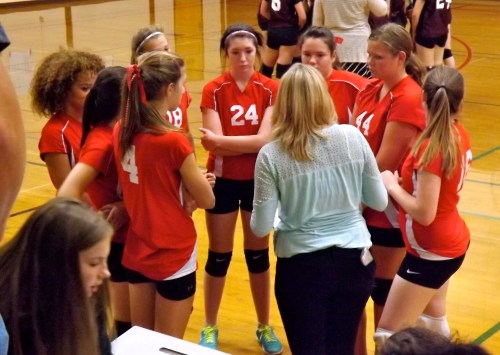 8th grade coach Sadi Foltz talks to her team.