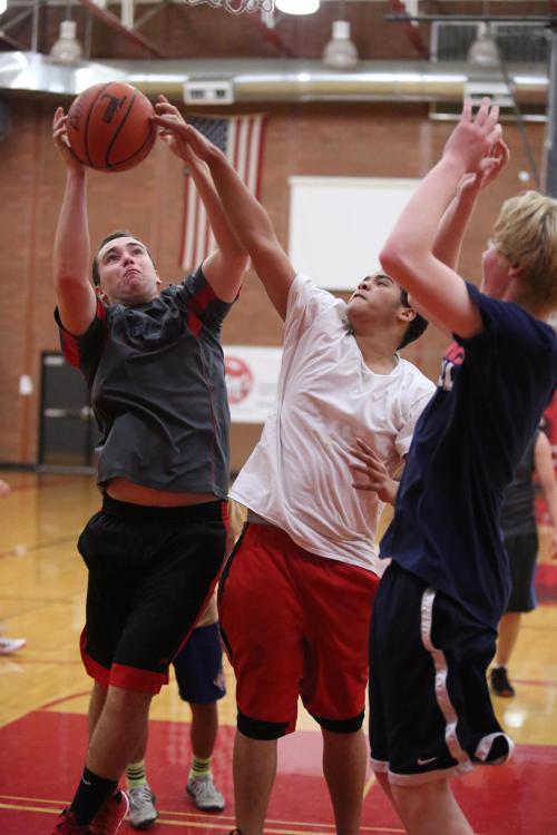 Aaron Trumbull (left) rumbles in the paint.
