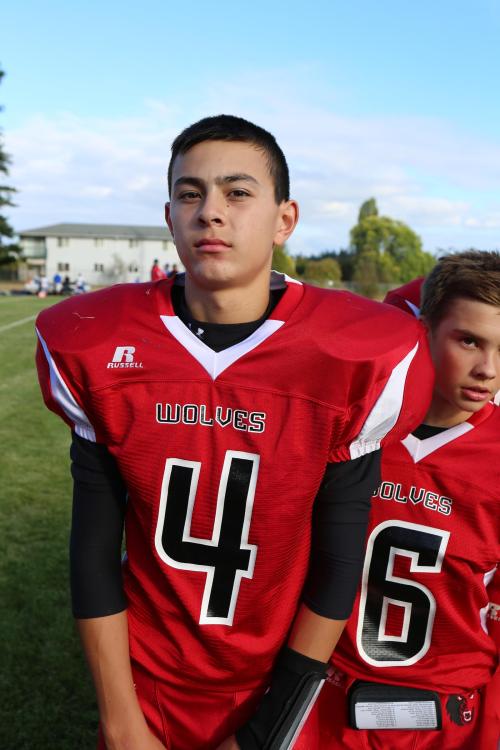 Wolf freshman Hunter Smith (4) continued his strong play, recovering a fumble Friday night. (John Fisken photo)