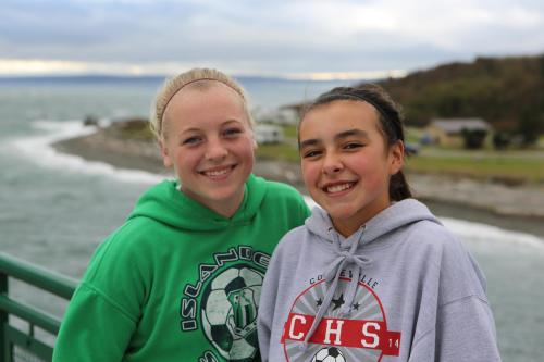 Sage Renninger (left) and Lauren Bayne enjoy the breezy outdoors.