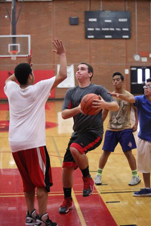 CHS hoops star Aaron Trumbull rumbles in the paint during a recent open gym. (John Fisken photos)