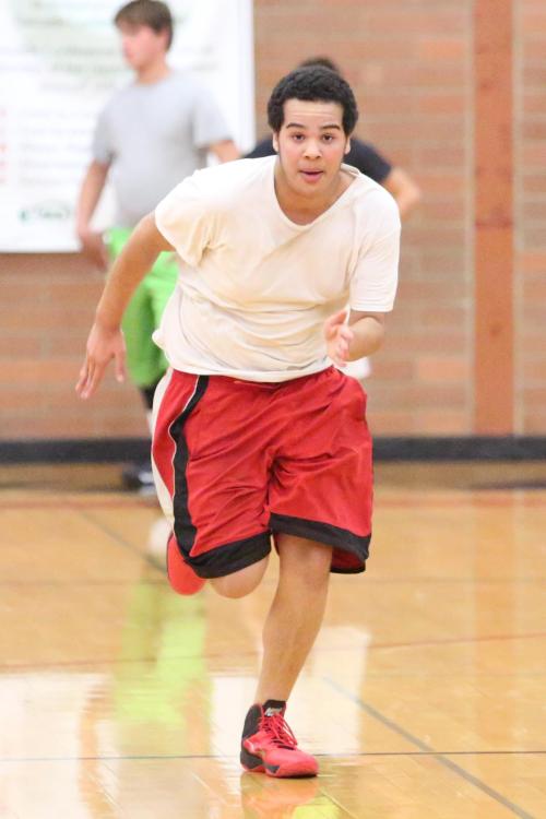 Desmond Bell charges up court during a conditioning drill. (John Fisken photos)