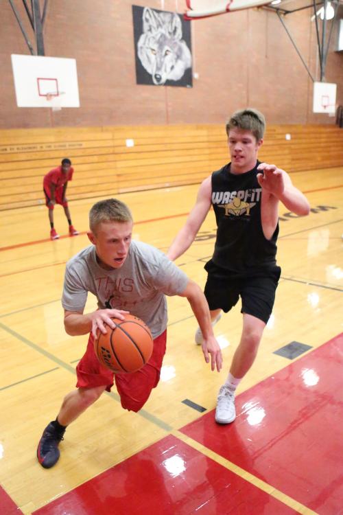 Martin drives the baseline looking for two, while Matt Shank prepares to unleash a little blocked shot special he likes to call "Make Your Mama Cry."
