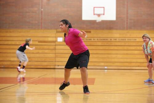 Herrera fights through a defensive drill under the watchful eye of Wolf JV coach Amy King.