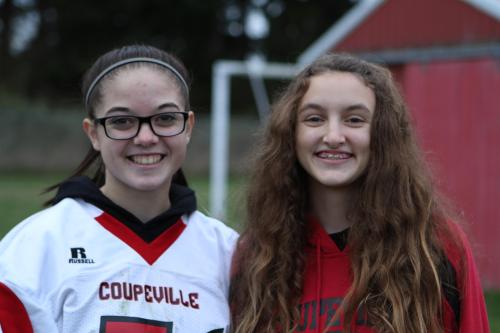 Freshmen Katrina McGranahan (left) and Skyy Lippo are all smiles during a CHS football game.