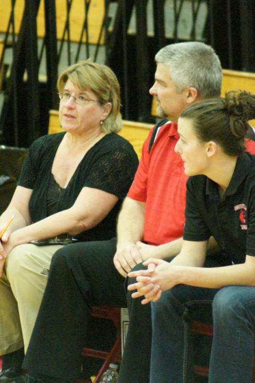 The Kings, seen here with assistant coach Brittany Black, will remain in charge of the Wolf girls' hoops squad.