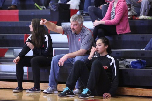 CHS coach David King imparts wisdom to Stone.