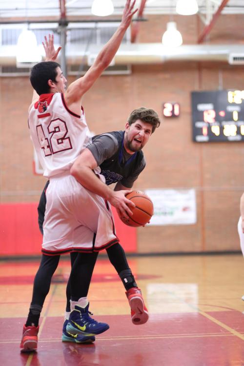 Ryan Griggs (42) hip is all, "You shall not pass!"