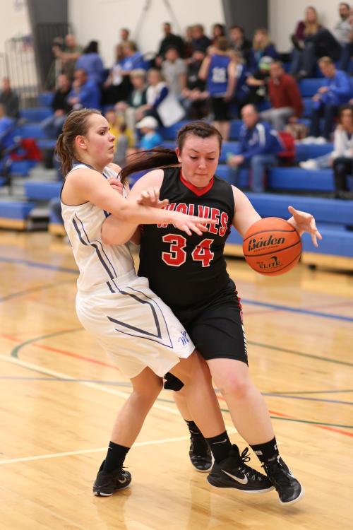 Only a fool gets between Hailey Hammer and the basket. (John Fisken photo)