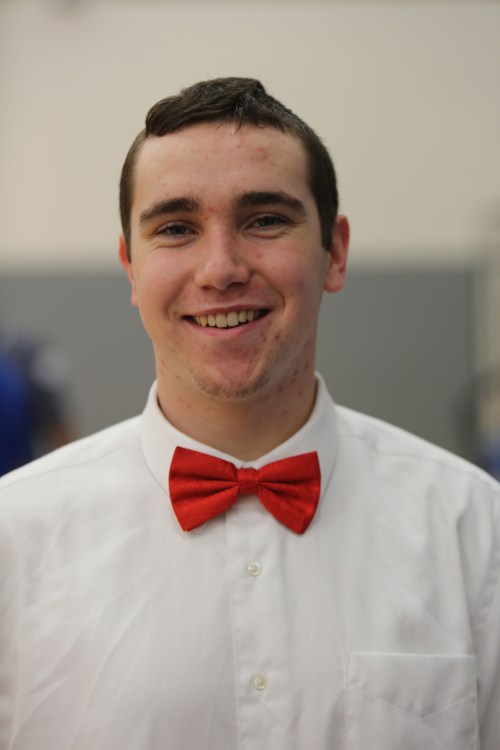 Snappy dresser, snappy player. Aaron Trumbull poured in 13 and snatched 13 boards Saturday. (John Fisken photo)