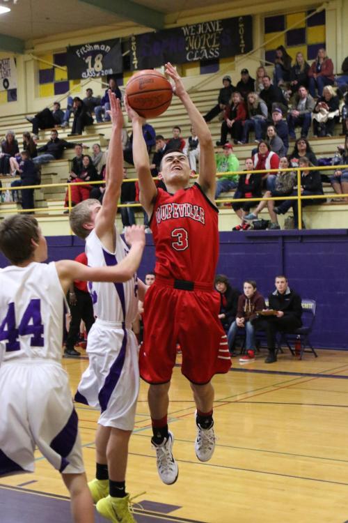CJ Smith (3) and the Wolf boys open the playoffs Saturday night at Cascade Christian. (John Fisken photos)