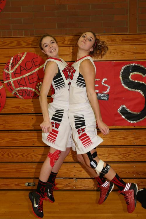 Kacie Kiel (left) and Julia Myers open every game with a chest bump, and it seems to . (John Fisken photos)