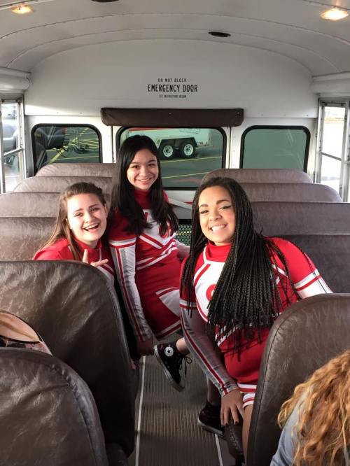 CHS cheerleaders (l to r) Camilla Rische, Robin Cedillo (rockin' the Chuck Taylors) and Ciera St Onge. (Amy King photo)