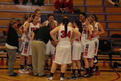 CHS coach David King makes a few points to his squad during a time-out. (Eileen Stone photos)