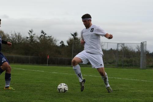 Aaron Wright strikes a dramatic pose against the prairie sky.